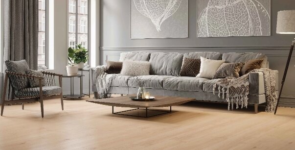 Living room with grey sofa on Durastar Silent Cork flooring